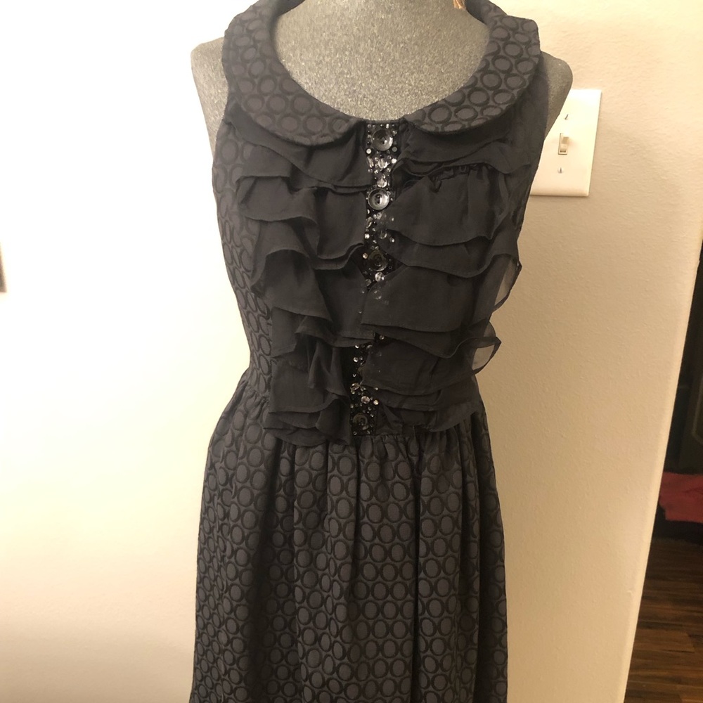 Black baby doll dress with ruffles sleeveless